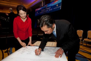 Dr. Hyun Jin Moon signing Atlanta Declaration on the Future of Hemispheric Relations