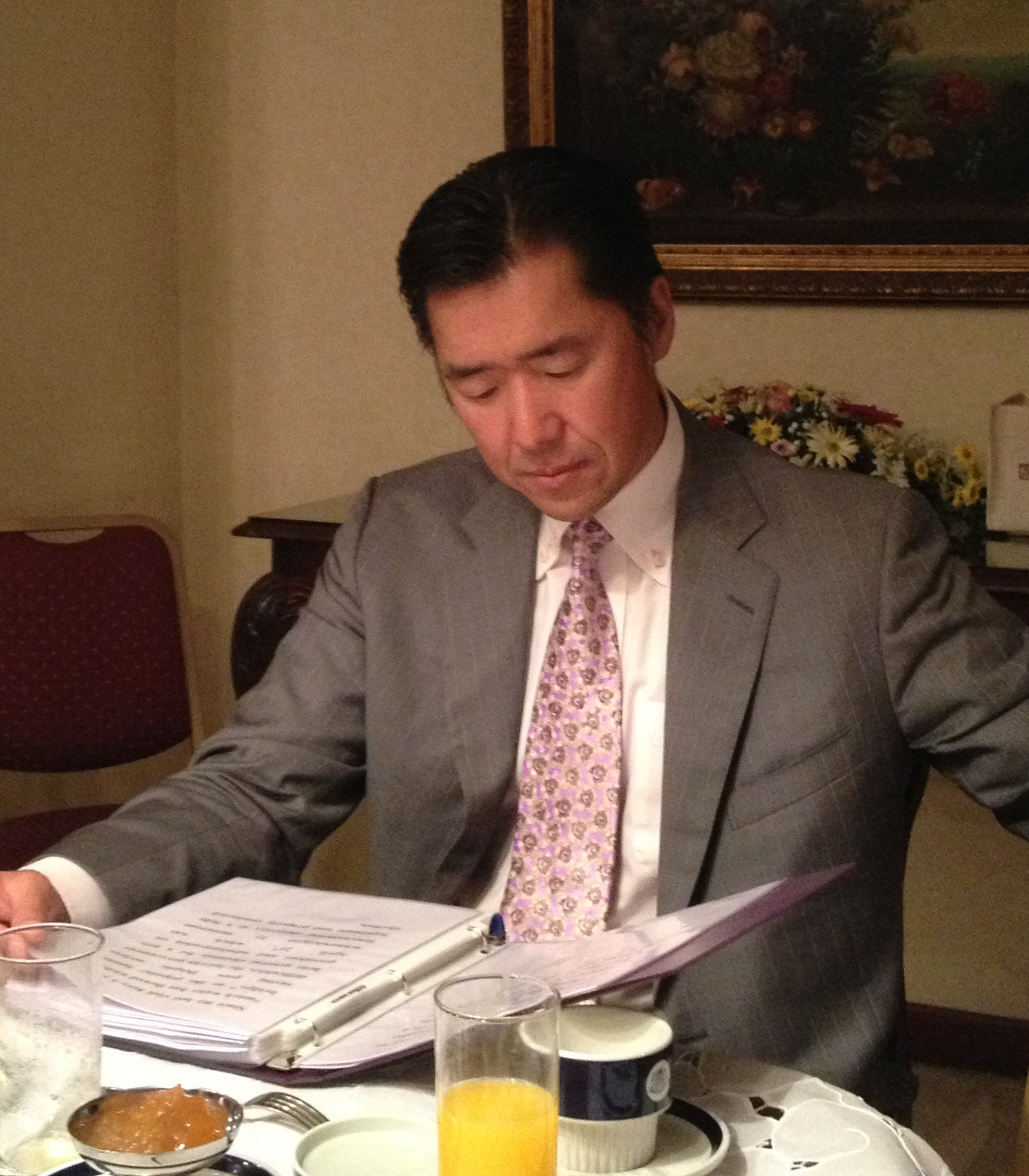 "Dr. Moon reviewing his speech prior to the opening plenary of the international conference on Governance, Ethics and Development."