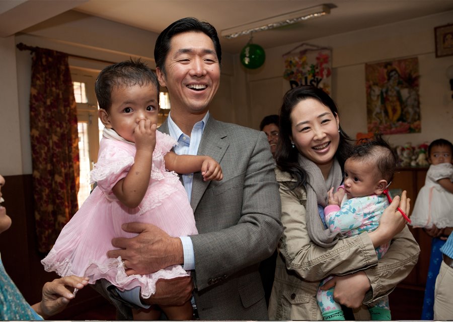 Dr. Moon and Mrs. Moon with children spend time with the children of Maiti Nepal in 2010.