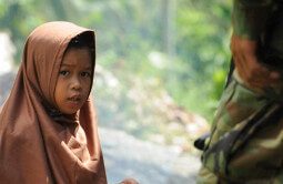 A young girl at Camp Salahuddin, a fishing village in the Tarragona district of Davao Oriental province on the Philippines island of Mindanao