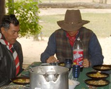 Dr. Hyun Jin Moon says grace before lunch in the town of Maria Auxilidora in Alto Paraguay.