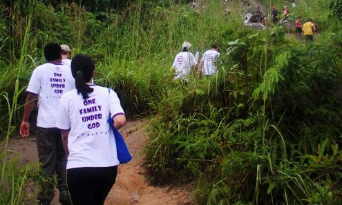 Participants hiking up to the top to build character through challenging experiences. 