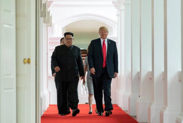 President Donald Trump meets with North Korean leader Kim Jong Un